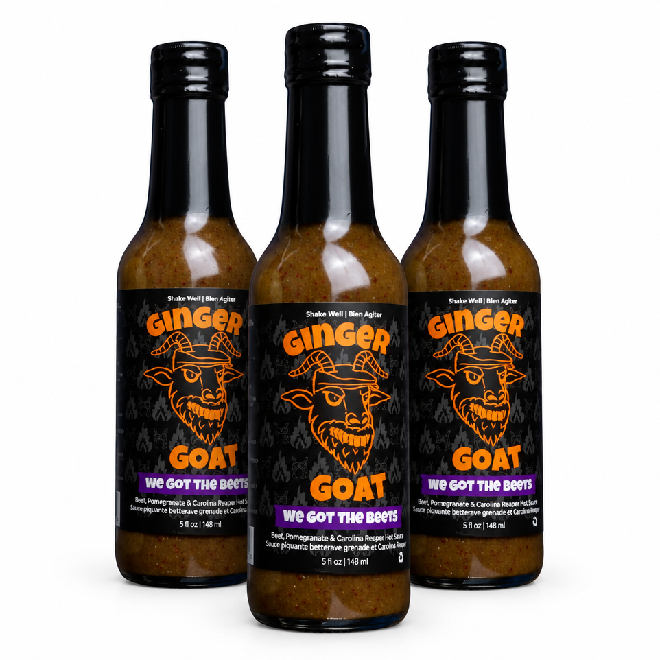 Three bottles of Ginger Goat We Got The Beets Reaper Hot Sauce