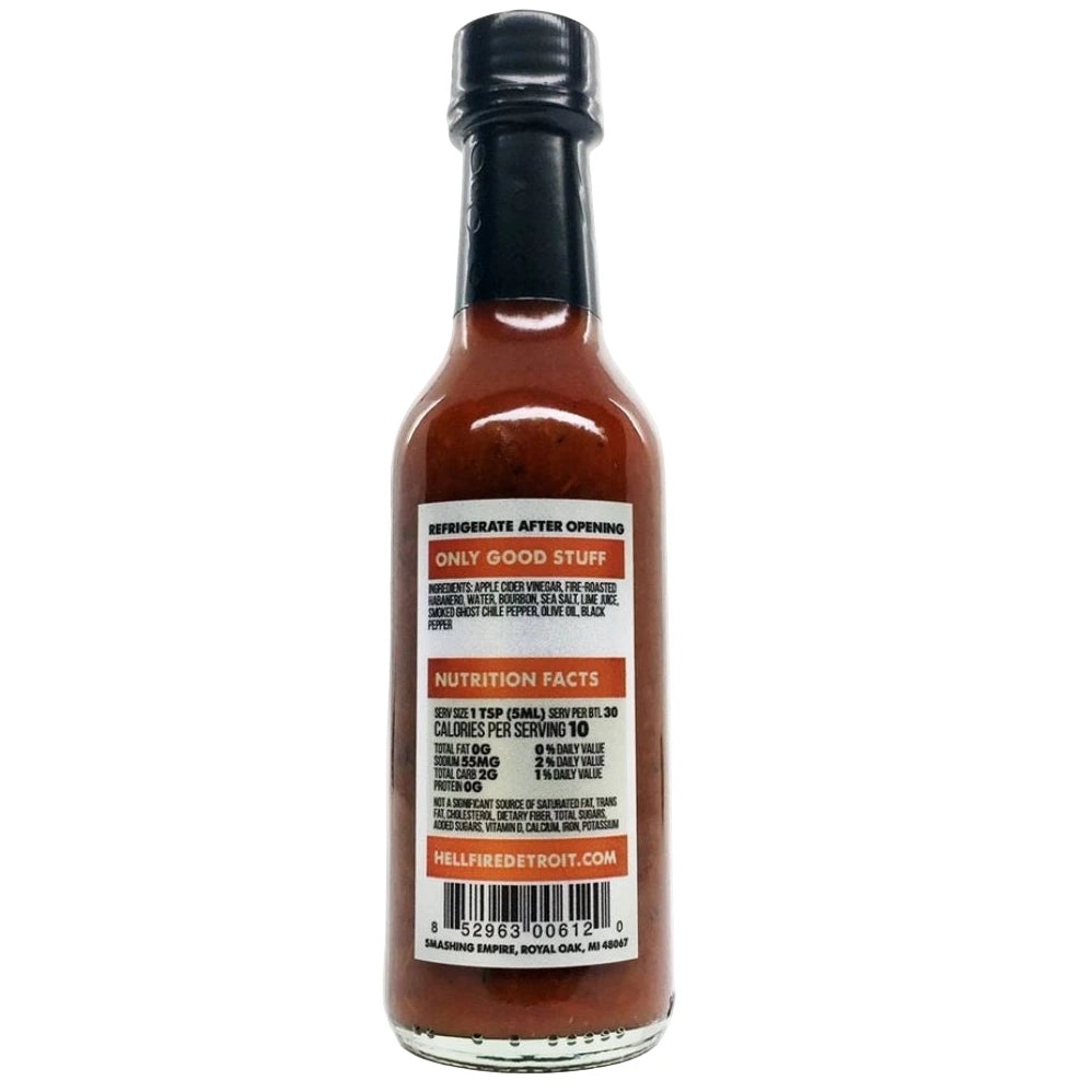 Bottle of Hell Fire Detroit Bourbon Habanero Ghost hot sauce with a label on a white background