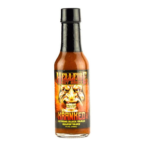Bottle of Hellfire Kranked Extreme Black Garlic Reaper Sauce on a white background
