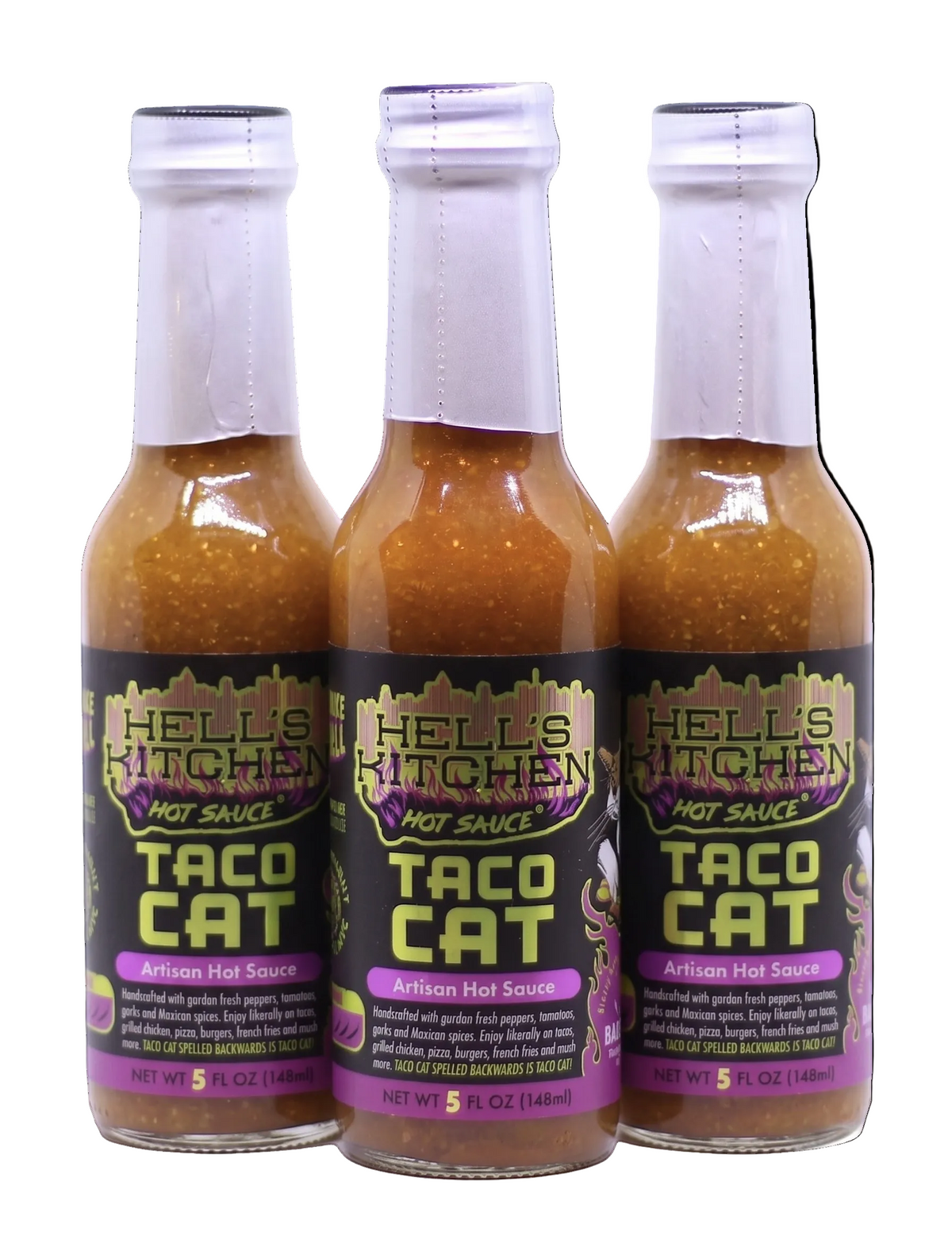 Three bottles of Hell's Kitchen Hot Sauce Taco Cat artisan hot sauce arranged side by side on a white background.
