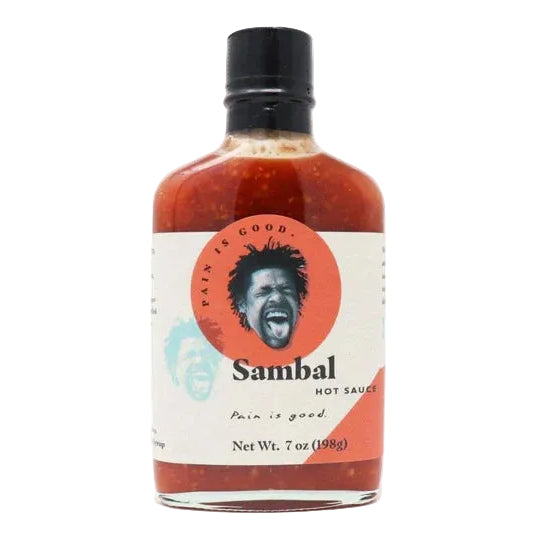 Bottle of Sambal hot sauce with a label featuring a person's face on a white background