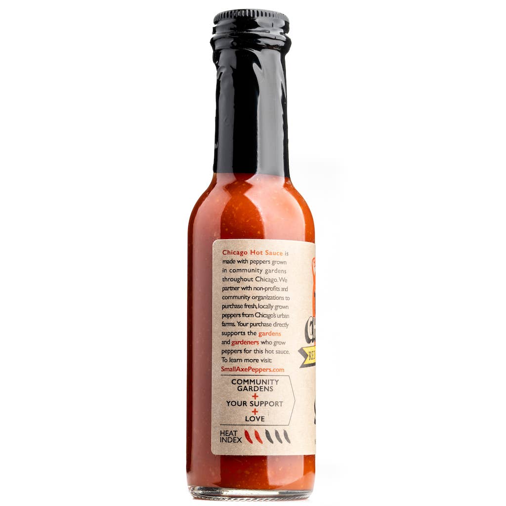 Bottle of Chicago Hot Sauce with label on a white background