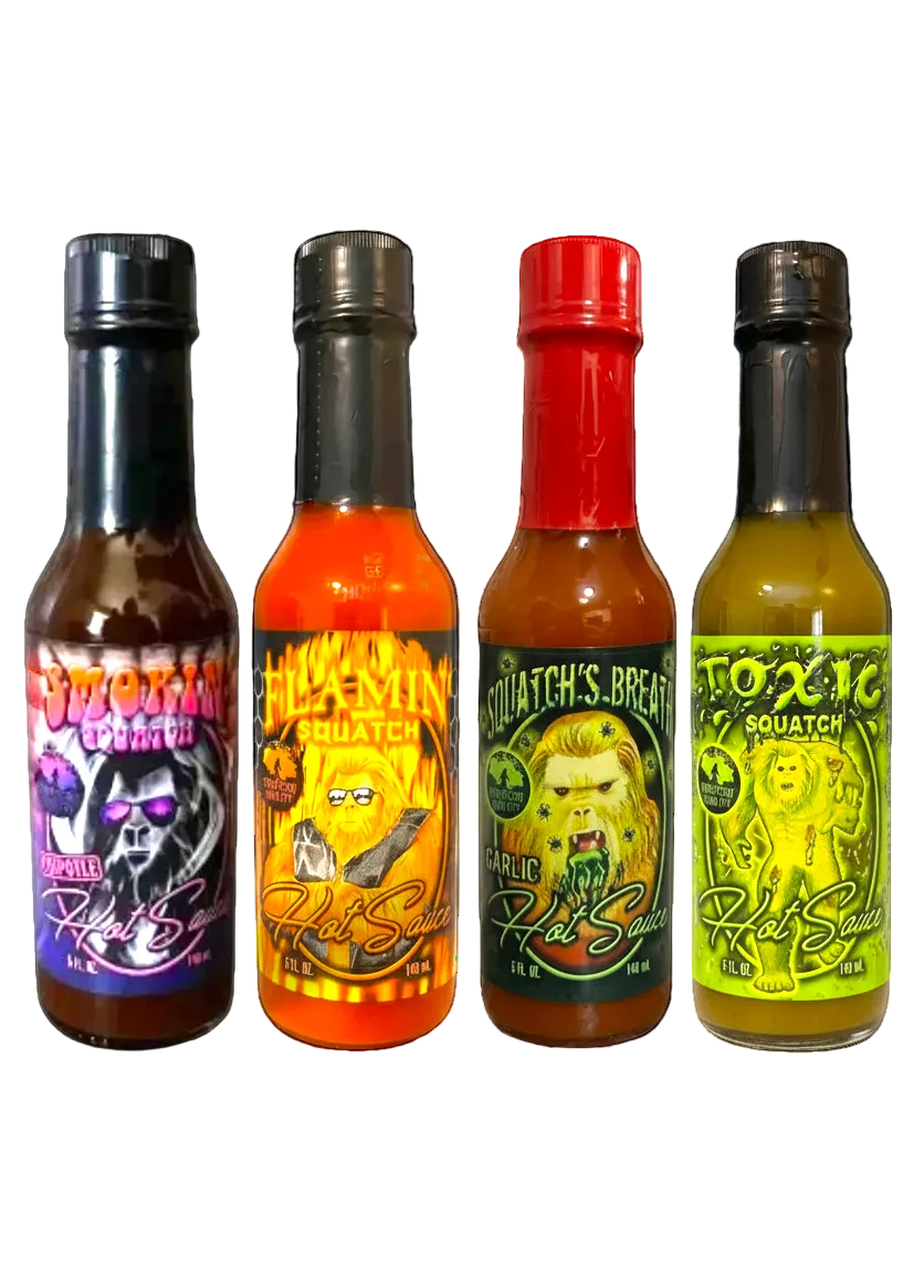 4 bottles of Squatchin hot sauce on a white background