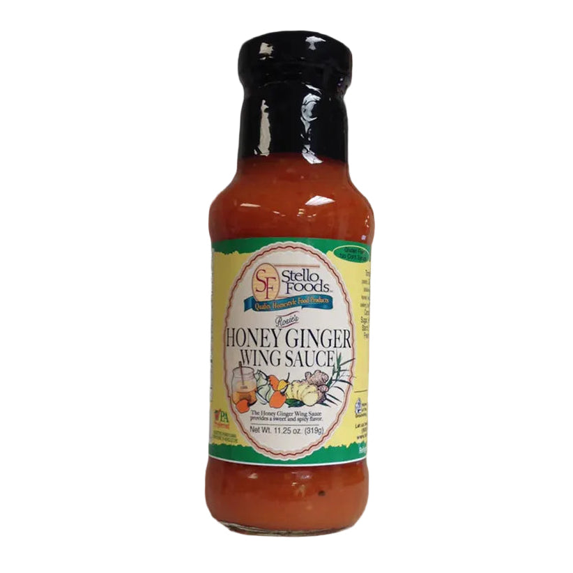 Bottle of Stoli Foods Honey Ginger Wing Sauce with wings in the background