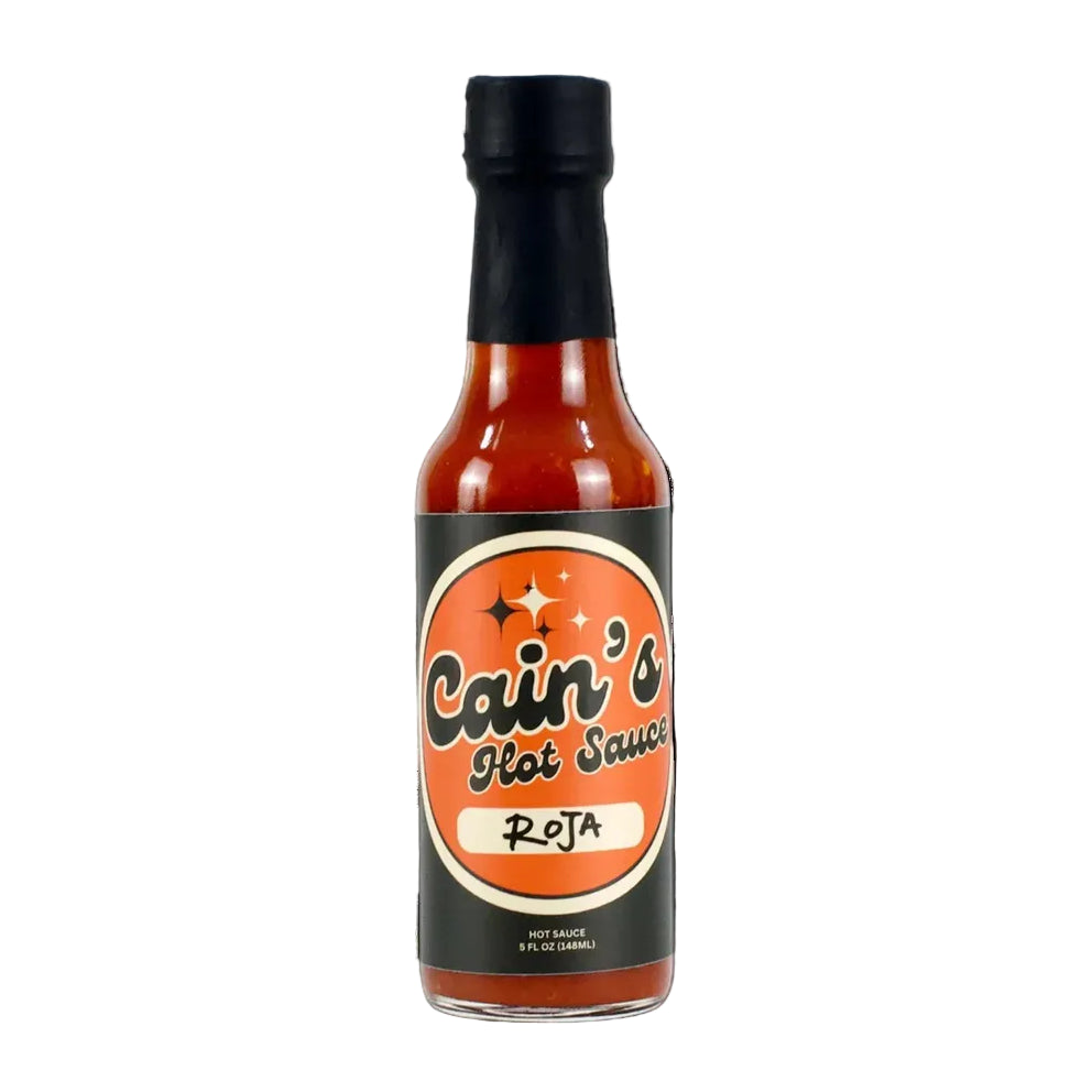 Bottle of Cain's Hot Sauce Roja on a white background