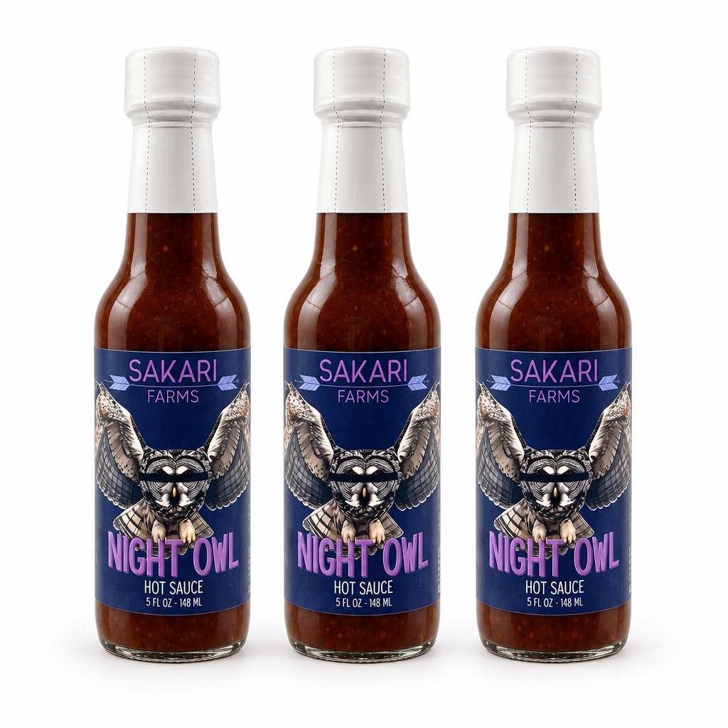 Three bottles of Sakari Farms Night Owl Hot Sauce