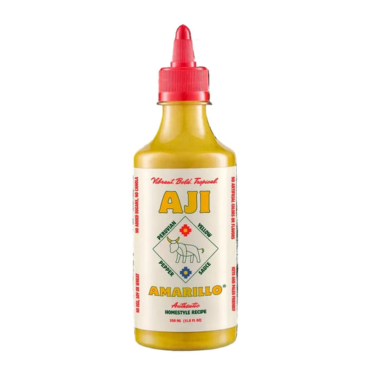 Bottle of Aji Amarillo hot pepper sauce on a white background