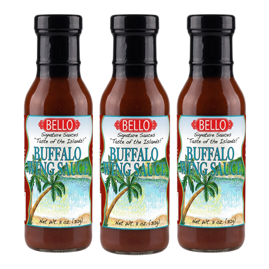 Three bottles of Bello Buffalo Wing Sauce arranged side by side on a plain white background. Each bottle contains reddish-brown sauce and has a black cap with a colorful label showing palm trees and beach scenery.