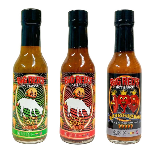 Three bottles of Big Red's hot sauce with colorful labels on a white background