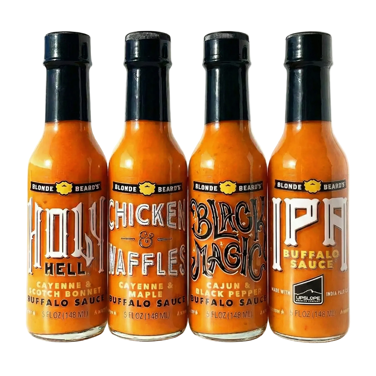 Four bottles of different types of Blonde Beard's Buffalo sauce on a white background