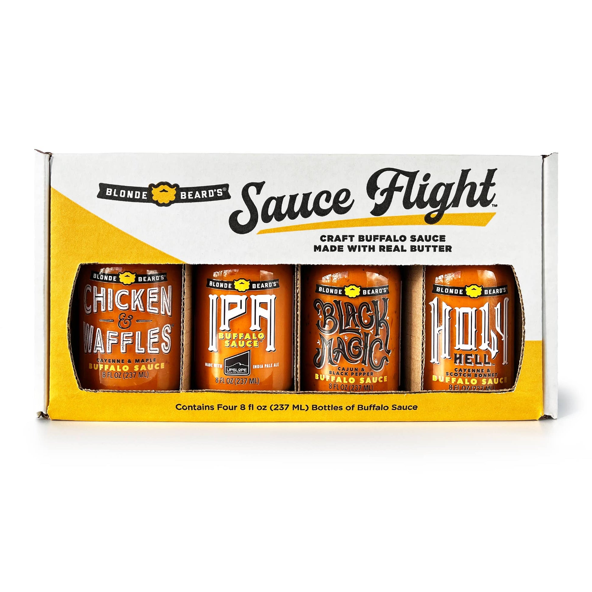 Packaging of Blonde Beard's Sauce Flight with four bottles of buffalo sauce on a white background