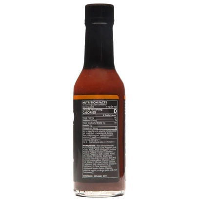 Bottle of Bravado Aka Miso Ghost Reaper hot sauce with nutrition facts label on a white background