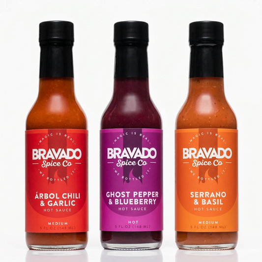 Three bottles of Bravado Spice Co hot sauces on a white background