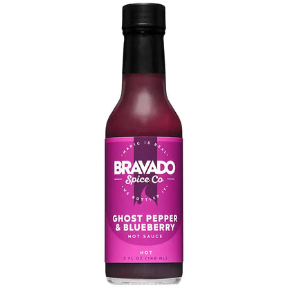 Bottle of Bravado Spice Co Ghost Pepper & Blueberry hot sauce on a white background