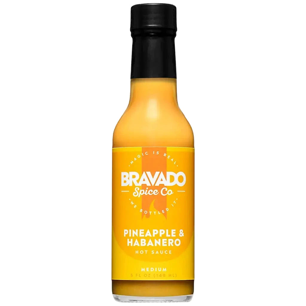 Bravado Spice Co Pineapple & Habanero hot sauce bottle on a white background