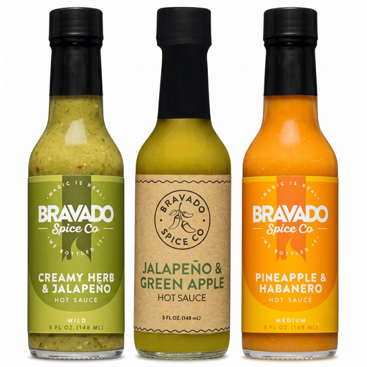 Three bottles of Bravado Spice Co hot sauces on a white background
