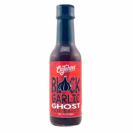 Bottle of Cajohn's Black Garlic Ghost Hot Sauce on a white background