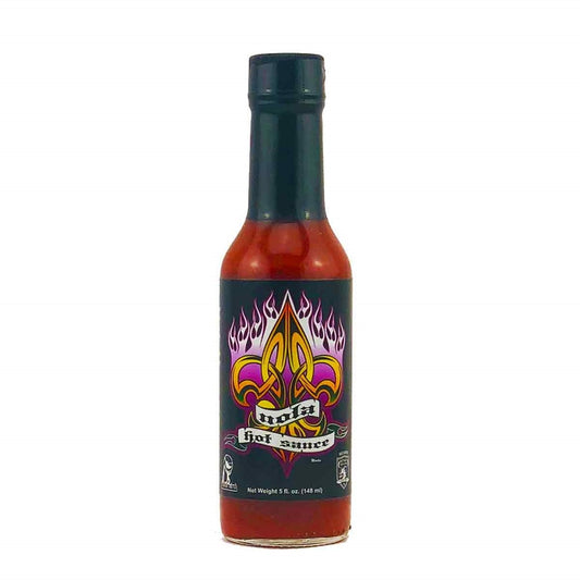 Bottle of hot sauce with a colorful label on a white background