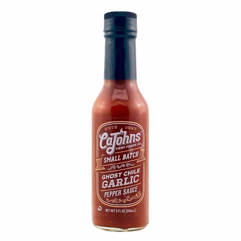 Bottle of CaJohns Ghost Chile Garlic Pepper Sauce on a white background