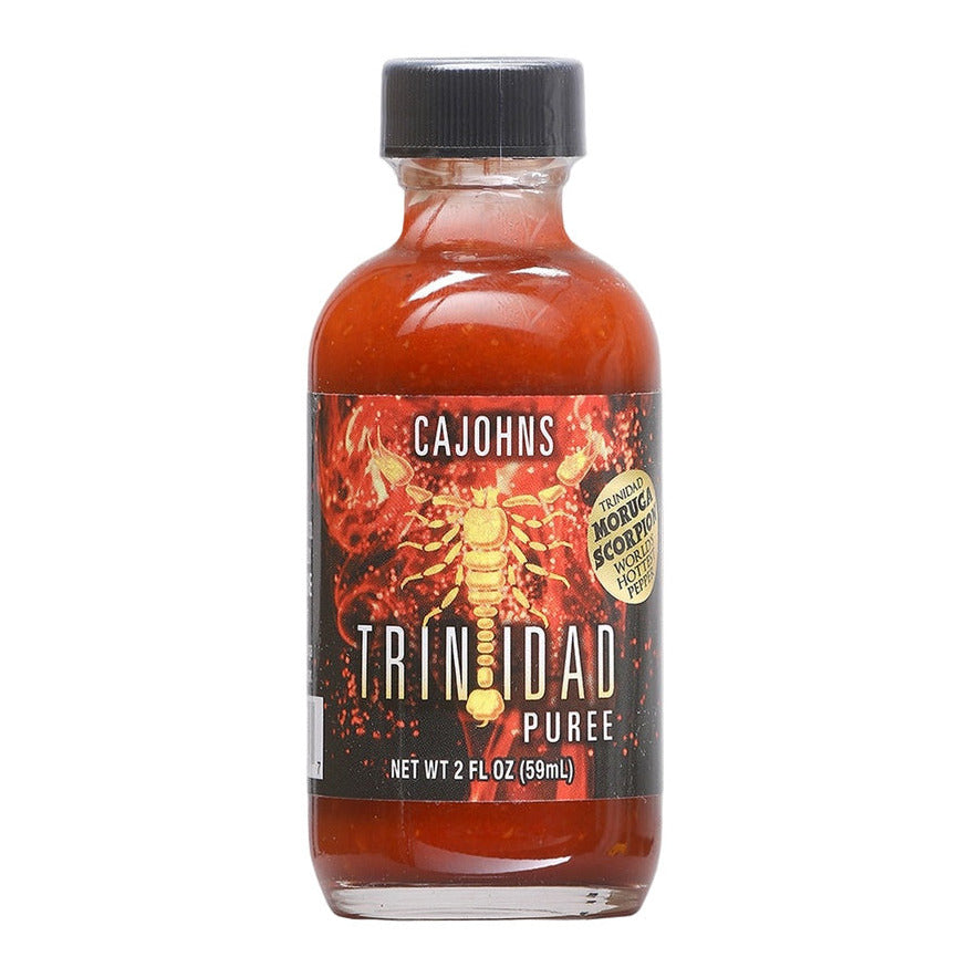 Bottle of Cajohns Trinidad Puree on a white background