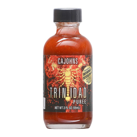 Bottle of Cajohns Trinidad Puree on a white background