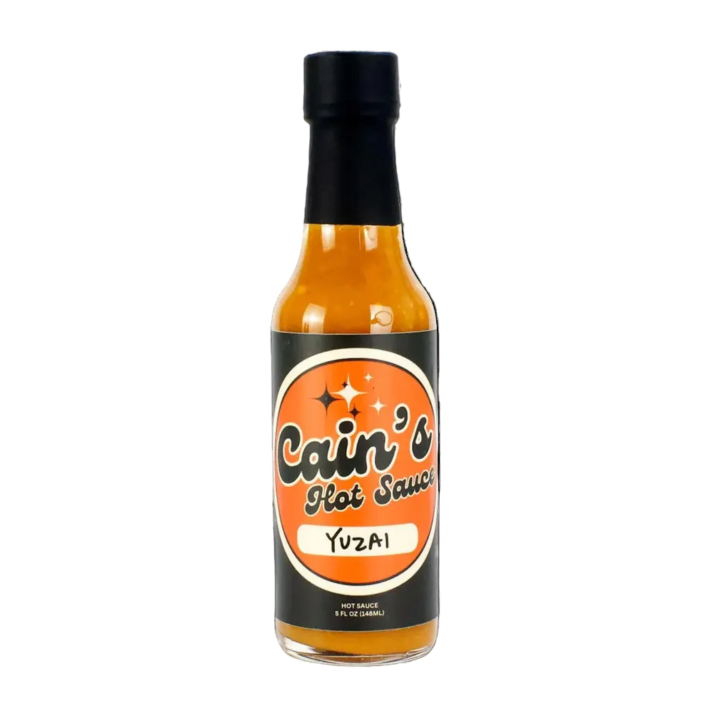 Bottle of Cain's Hot Sauce Yuzai on a white background
