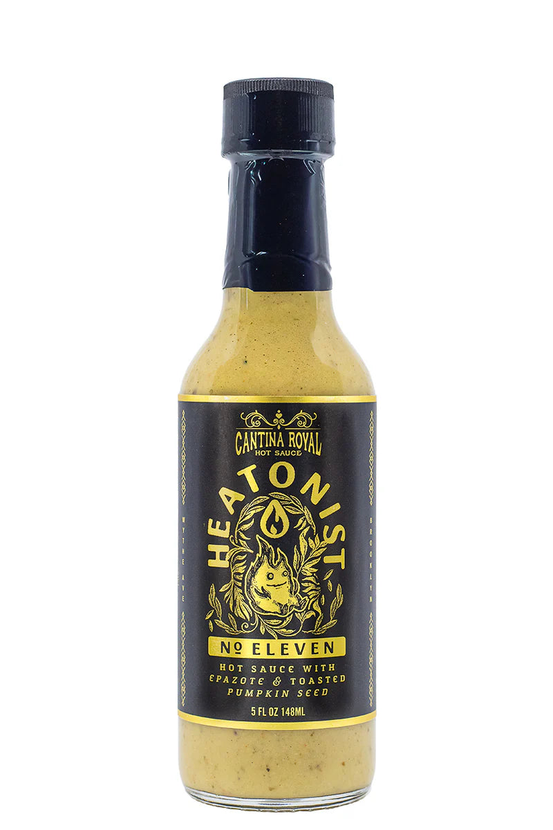 Bottle of Heatonist No Eleven hot sauce with a black label on a white background