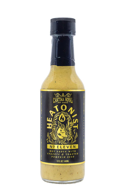 Bottle of Heatonist No Eleven hot sauce with a black label on a white background