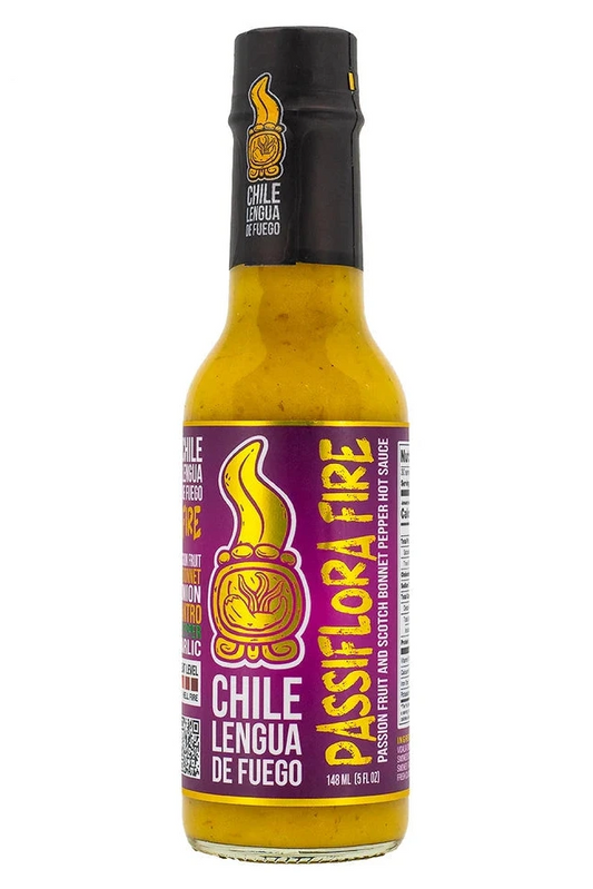 Passiflora Fire hot sauce bottle with black cap on a white background