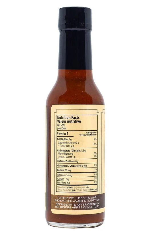Bottle of Dawson's Coffee Date hot sauce with nutrition label on a white background