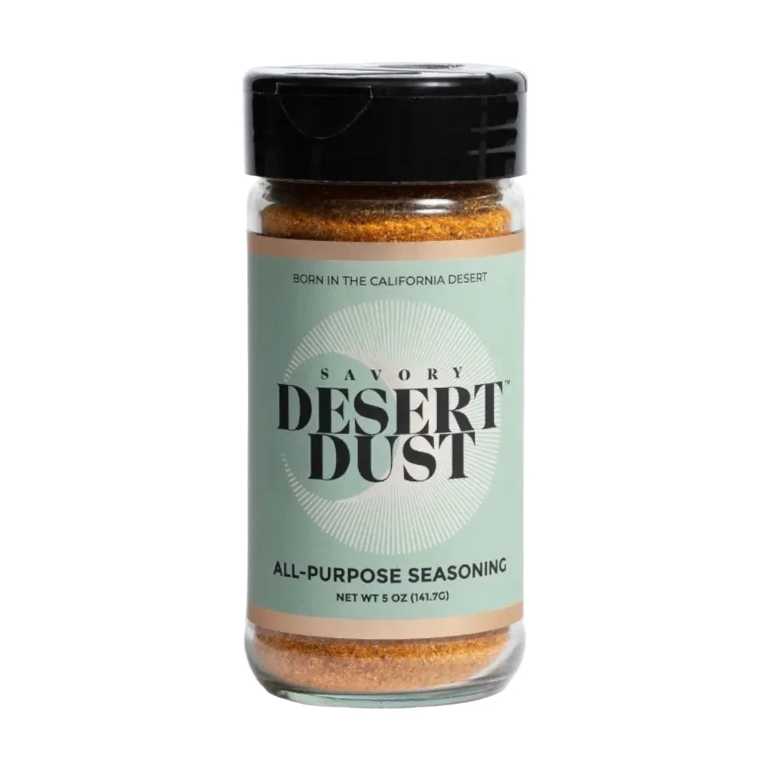 Jar of Savory Desert Dust all-purpose seasoning on a white background