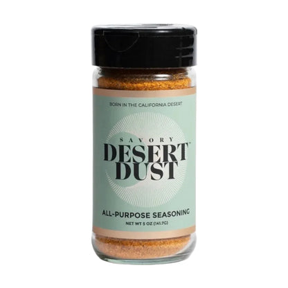 Jar of Savory Desert Dust all-purpose seasoning on a white background