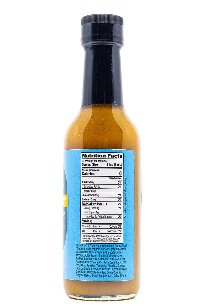 A bottle of hot sauce shown from the back, featuring a light blue Nutrition Facts label and a black cap, on a white background.