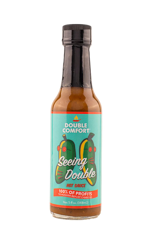 Hot sauce bottle with a colorful label on a white background