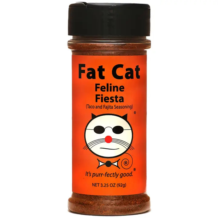 Spice jar labeled 'Fat Cat Feline Fiesta' on an orange background