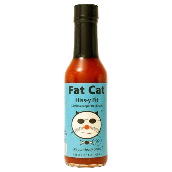 Bottle of Fat Cat Hiss-y Fit hot sauce on a white background