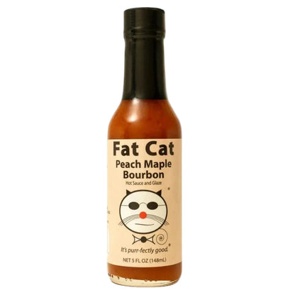 Fat Cat Peach Maple Bourbon hot sauce bottle on a white background
