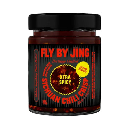Jar of 'Fly By Jing' Sichuan Chili Crisp on a white background