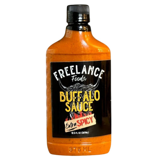 Bottle of Freelance Foods Buffalo Sauce on a white background