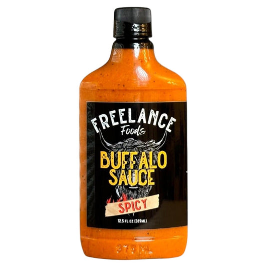 Bottle of Freelance Foods Buffalo Sauce on a white background