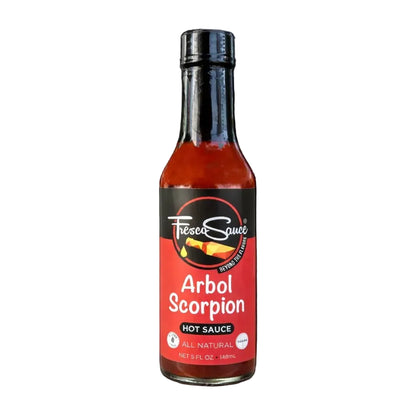 Bottle of Tesoro Arbol Scorpion hot sauce on a white background