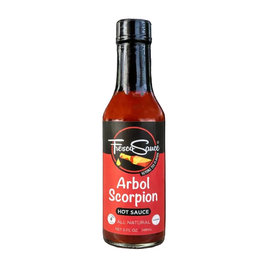 Bottle of Tesoro Arbol Scorpion hot sauce on a white background