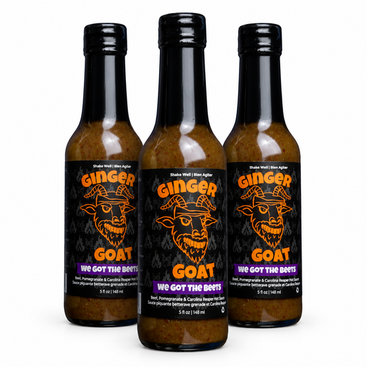 Three bottles of Ginger Goat We Got The Beets Reaper Hot Sauce