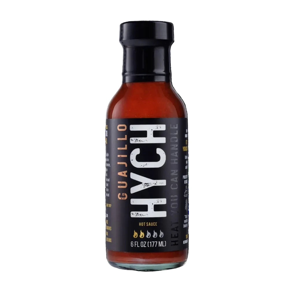 Bottle of HYCH Guajillo hot sauce on a white background