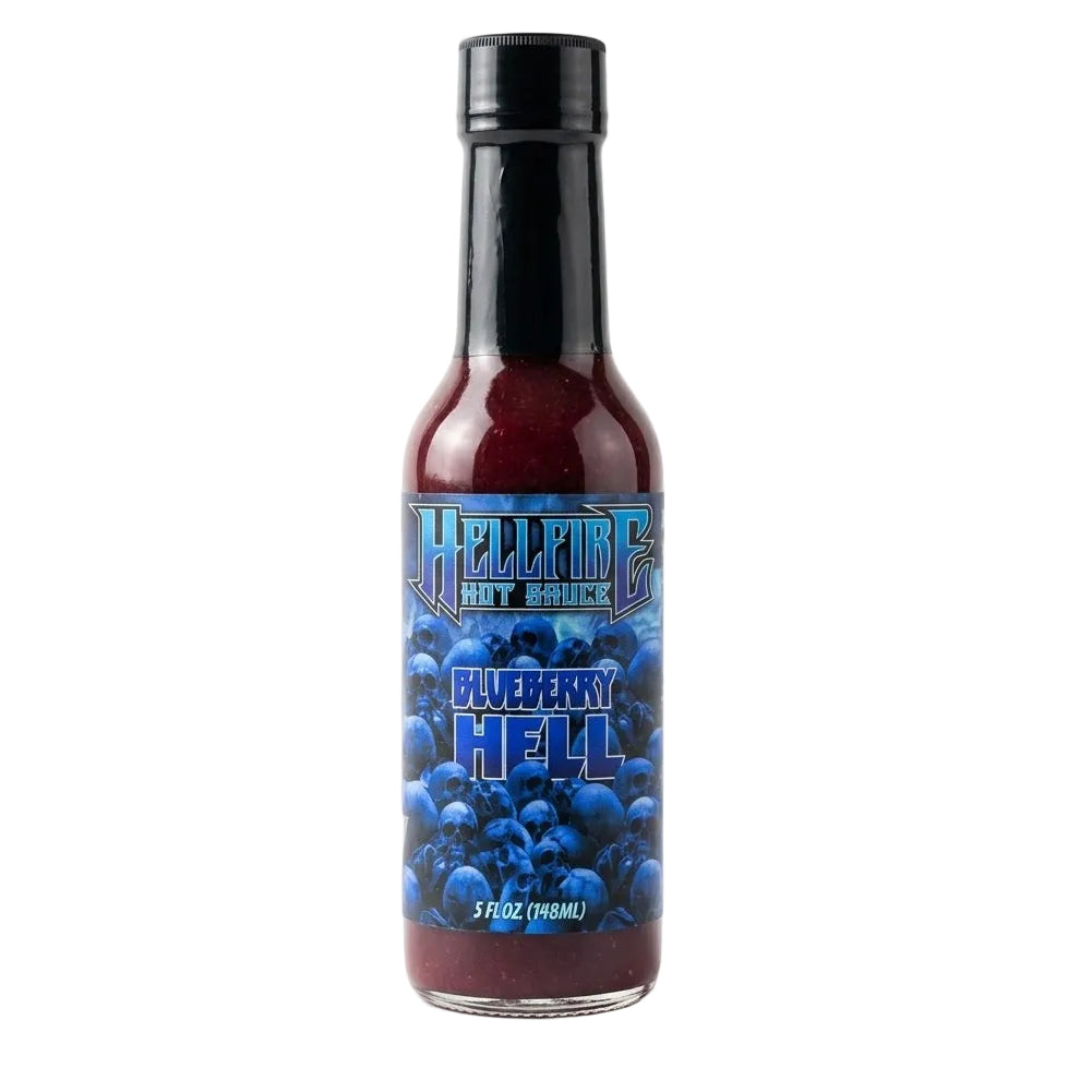 A bottle of Hellfire Hot Sauce with Blueberry Hell flavor, featuring a black cap and a blueberry-themed label, set against a plain white background.