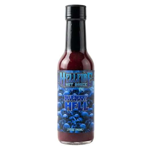 A bottle of Hellfire Hot Sauce with Blueberry Hell flavor, featuring a black cap and a blueberry-themed label, set against a plain white background.