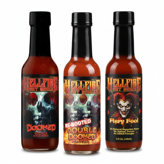 Three bottles of Hellfire Hot Sauce with colorful labels on a white background