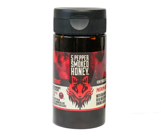 Jar of 5 Pepper Smoked Honey with a bowl of honey and dipper on a white background