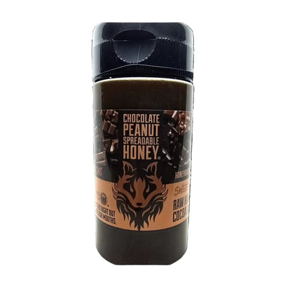Container of chocolate peanut spreadable honey with a black lid on a white background
