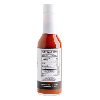 Hook and Arrow Hot sauce bottle with nutrition facts label on a white background